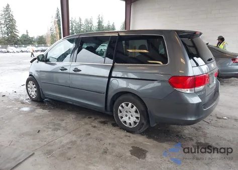 2010 Honda Odyssey Lx z USA, uszkodzony, nr VIN 5FNRL3H24AB059836